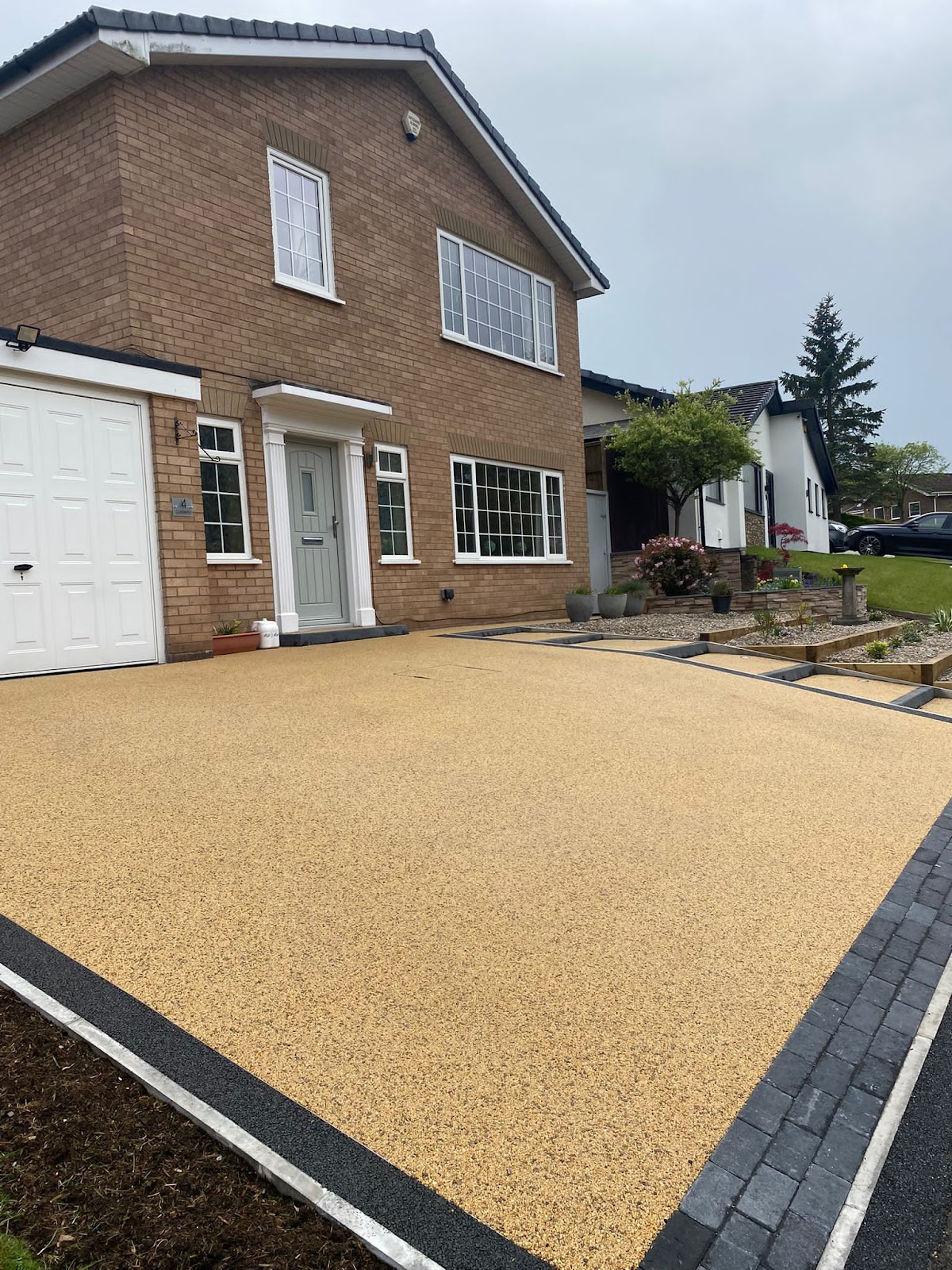 Golden resin bound driveway with block paving border, Greater Manchester